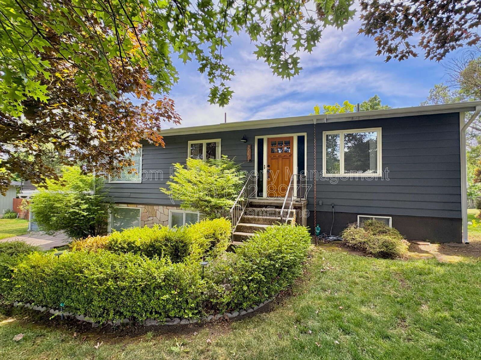 Spacious 4 Bed + Flex Space Coeur d'Alene Home | 2,640 Sq Ft, Beautifully Updated, Large Deck with Views, Carport & Great Location property image