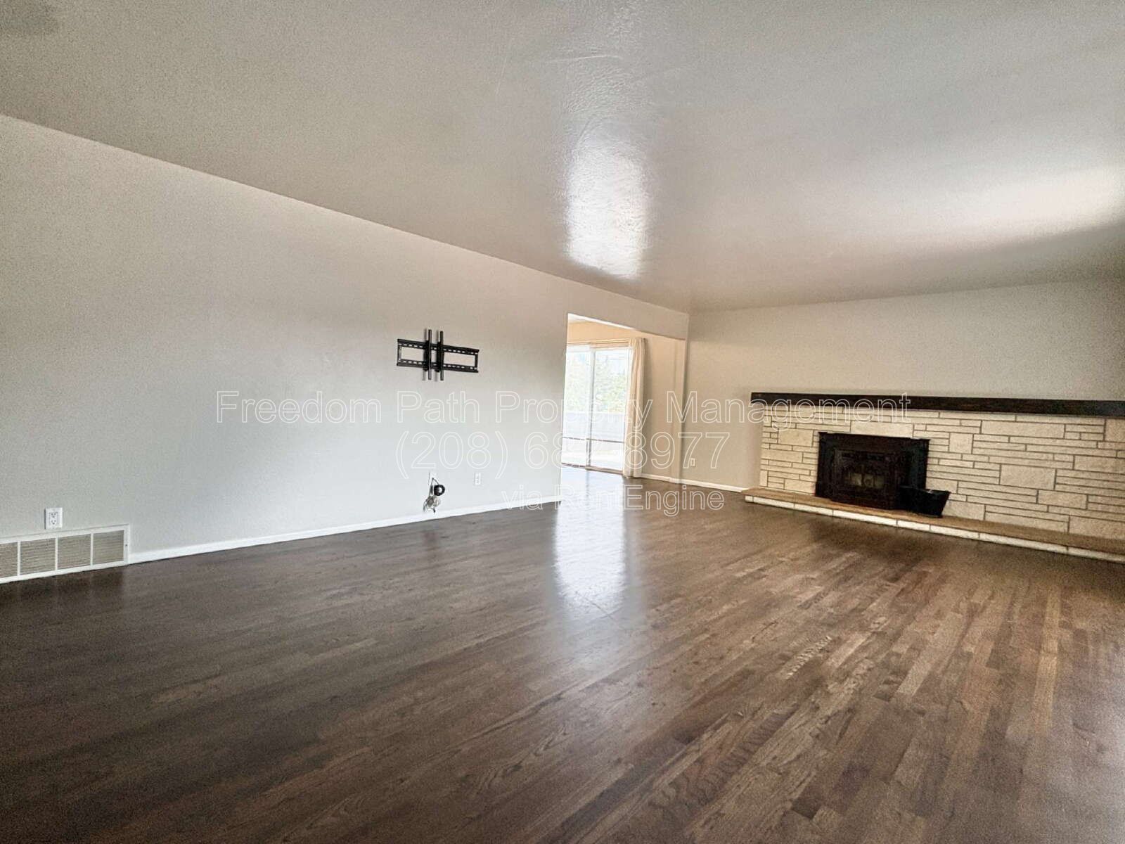 Spacious 4 Bed + Flex Space Coeur d'Alene Home | 2,640 Sq Ft, Beautifully Updated, Large Deck with Views, Carport & Great Location property image