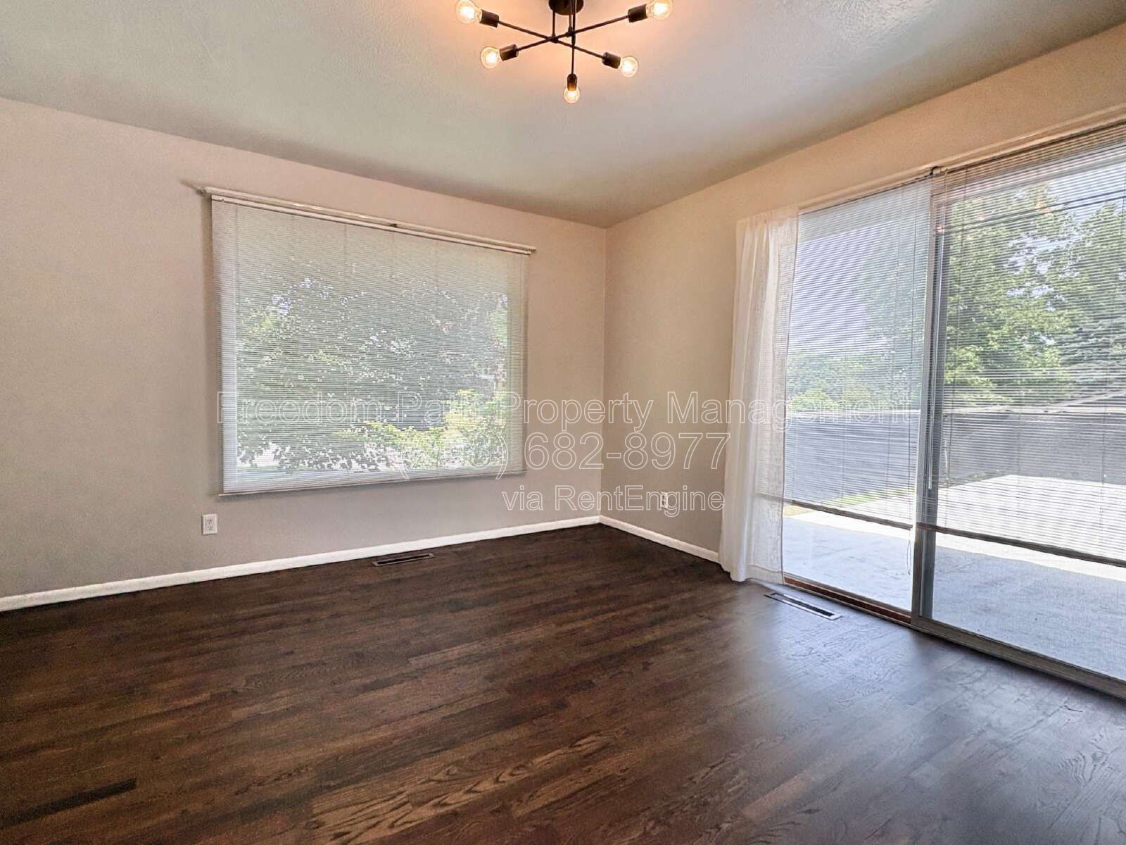 Spacious 4 Bed + Flex Space Coeur d'Alene Home | 2,640 Sq Ft, Beautifully Updated, Large Deck with Views, Carport & Great Location property image