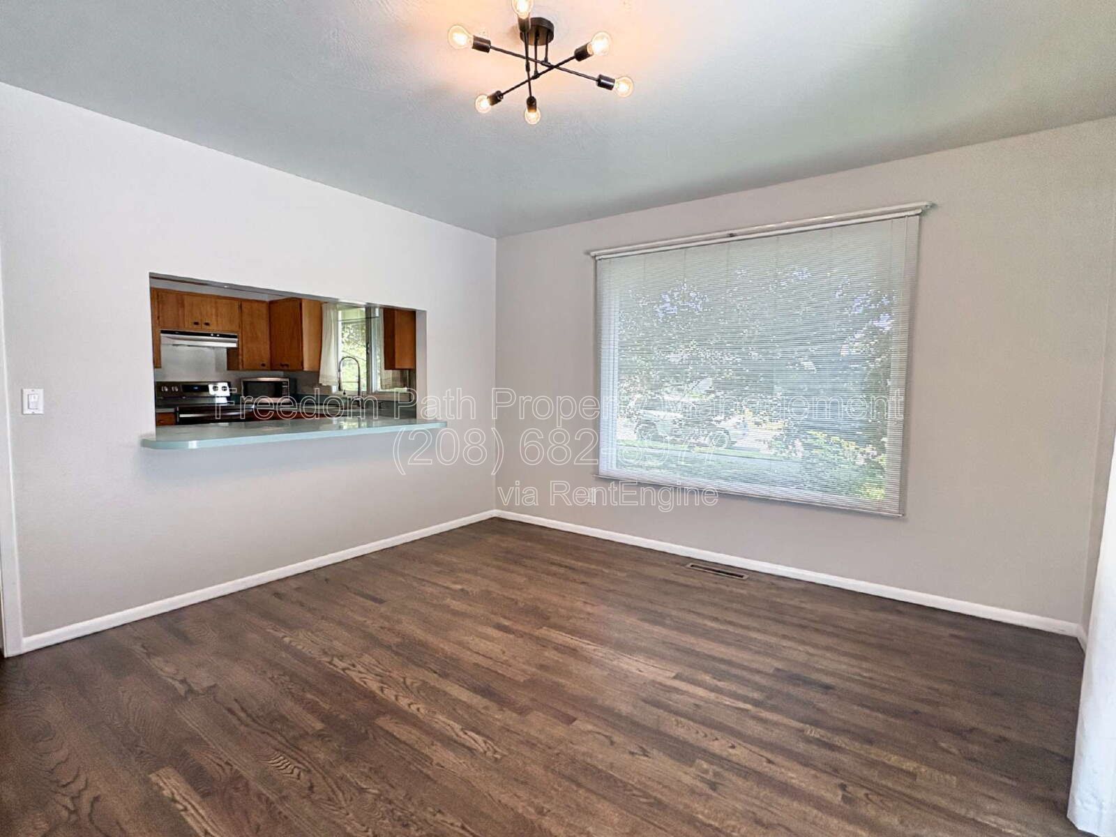 Spacious 4 Bed + Flex Space Coeur d'Alene Home | 2,640 Sq Ft, Beautifully Updated, Large Deck with Views, Carport & Great Location property image