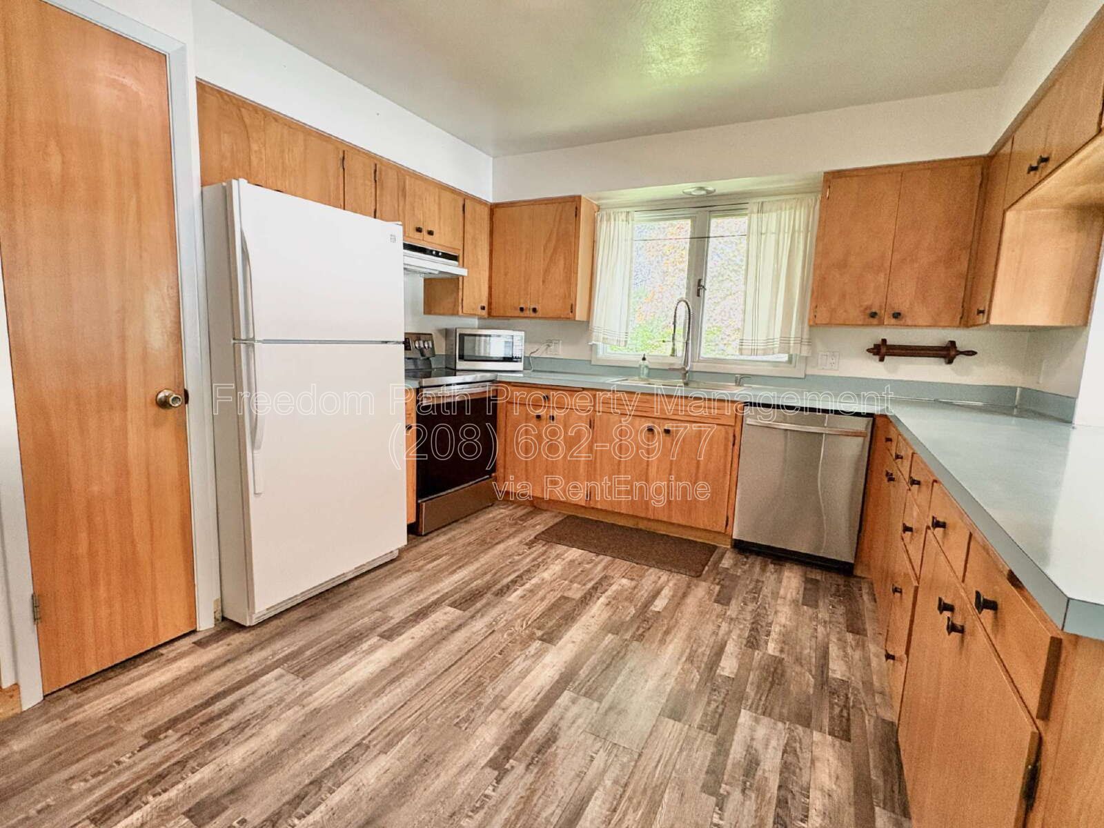 Spacious 4 Bed + Flex Space Coeur d'Alene Home | 2,640 Sq Ft, Beautifully Updated, Large Deck with Views, Carport & Great Location property image