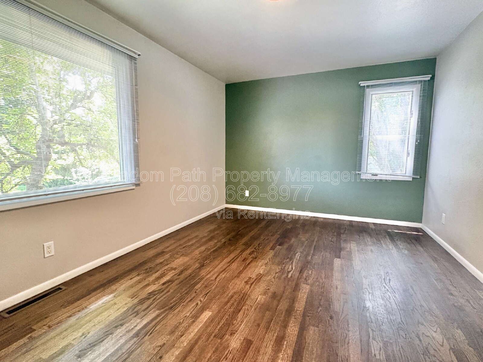 Spacious 4 Bed + Flex Space Coeur d'Alene Home | 2,640 Sq Ft, Beautifully Updated, Large Deck with Views, Carport & Great Location property image