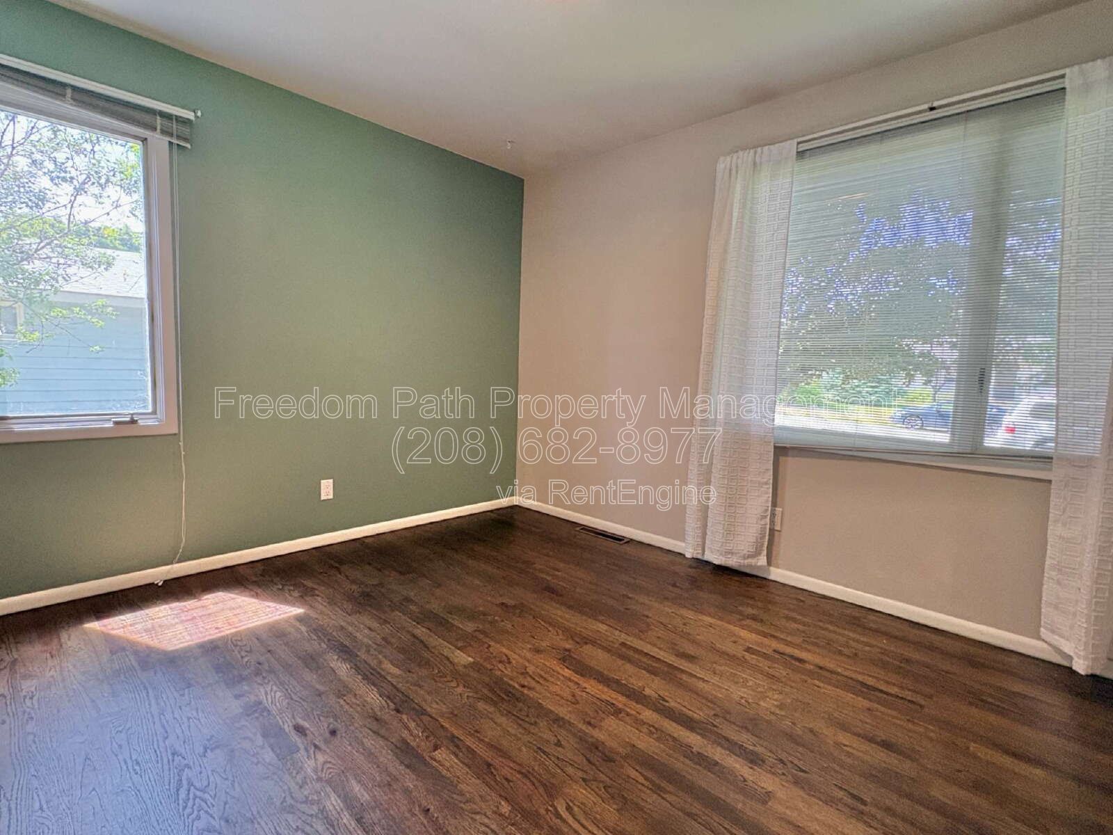 Spacious 4 Bed + Flex Space Coeur d'Alene Home | 2,640 Sq Ft, Beautifully Updated, Large Deck with Views, Carport & Great Location property image