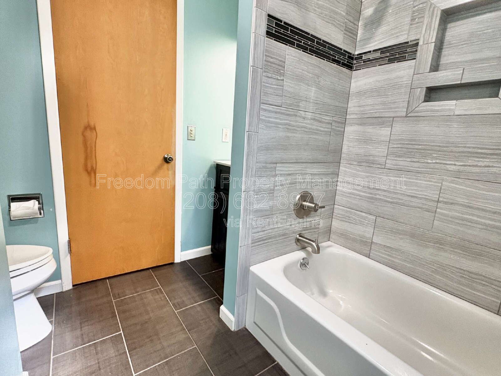 Spacious 4 Bed + Flex Space Coeur d'Alene Home | 2,640 Sq Ft, Beautifully Updated, Large Deck with Views, Carport & Great Location property image