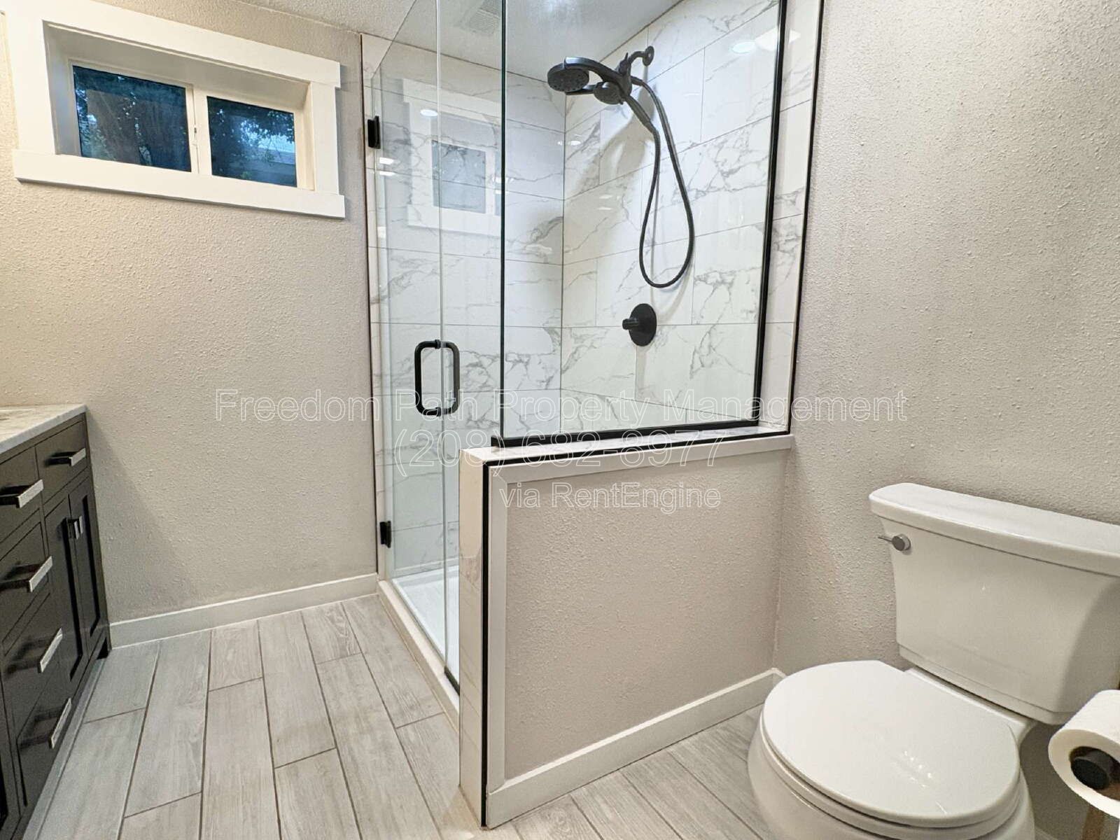 Spacious 4 Bed + Flex Space Coeur d'Alene Home | 2,640 Sq Ft, Beautifully Updated, Large Deck with Views, Carport & Great Location property image