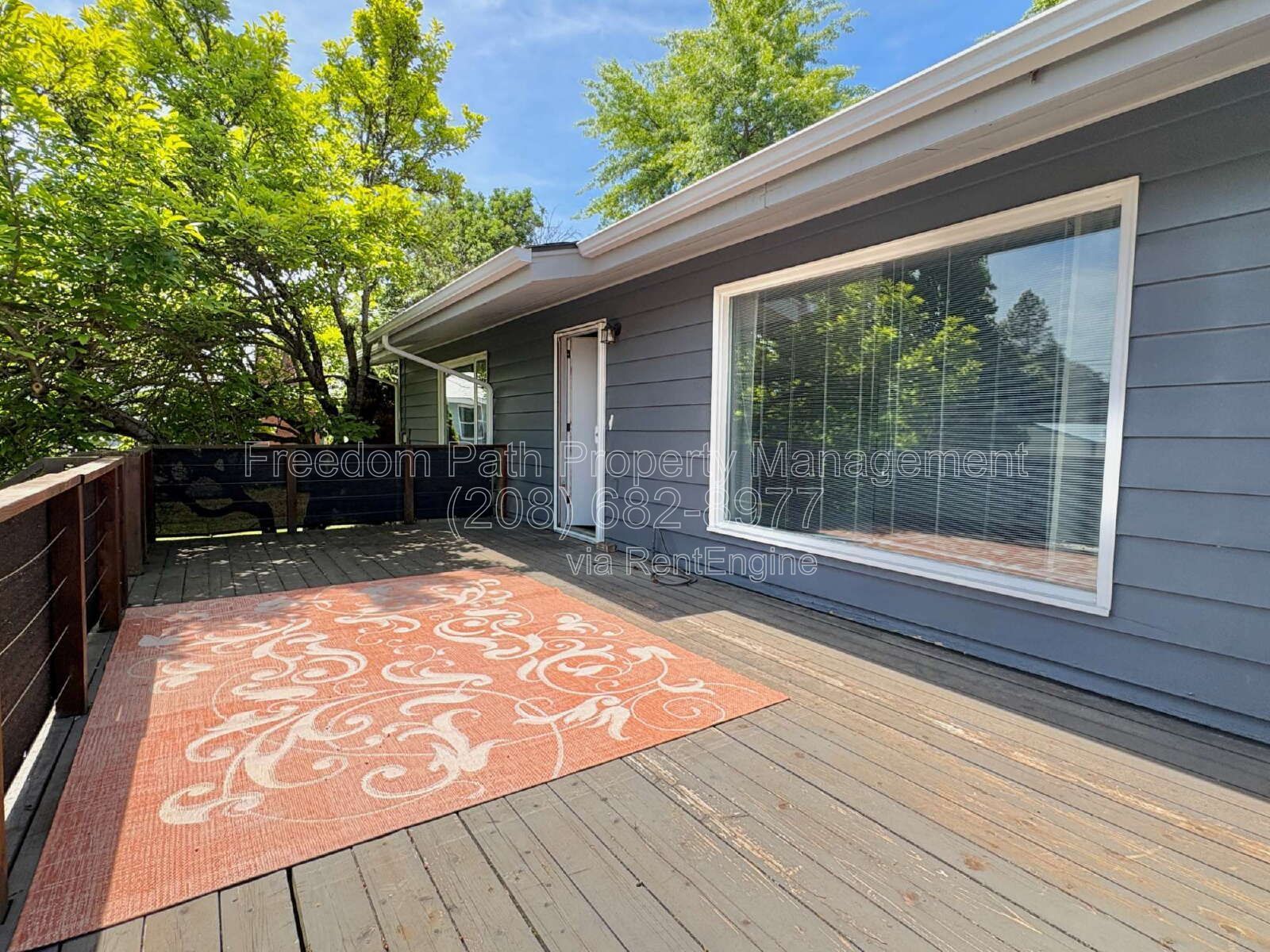 Spacious 4 Bed + Flex Space Coeur d'Alene Home | 2,640 Sq Ft, Beautifully Updated, Large Deck with Views, Carport & Great Location property image