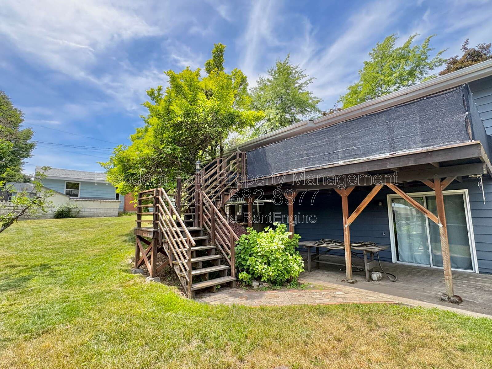 Spacious 4 Bed + Flex Space Coeur d'Alene Home | 2,640 Sq Ft, Beautifully Updated, Large Deck with Views, Carport & Great Location property image