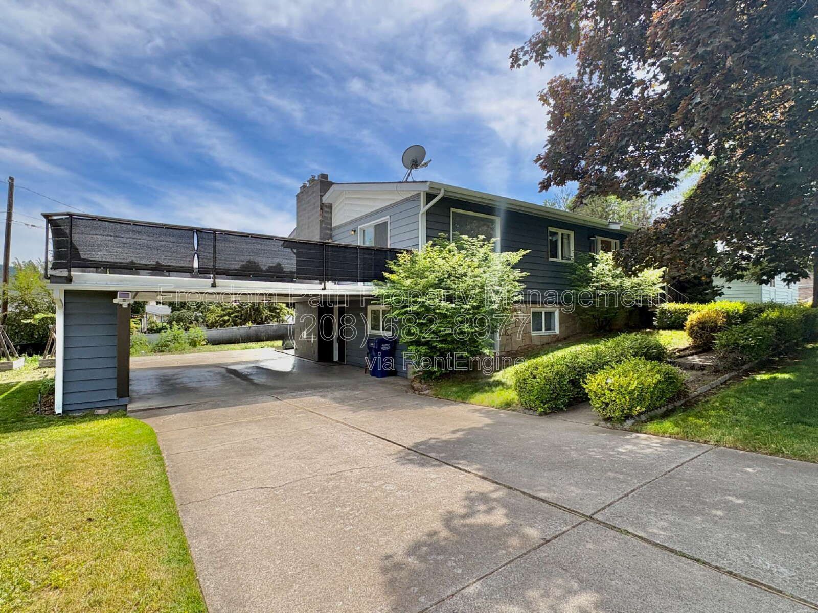 Spacious 4 Bed + Flex Space Coeur d'Alene Home | 2,640 Sq Ft, Beautifully Updated, Large Deck with Views, Carport & Great Location property image