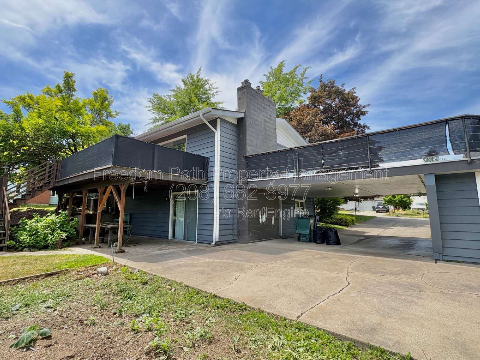 Spacious 4 Bed + Flex Space Coeur d'Alene Home | 2,640 Sq Ft, Beautifully Updated, Large Deck with Views, Carport & Great Location property image