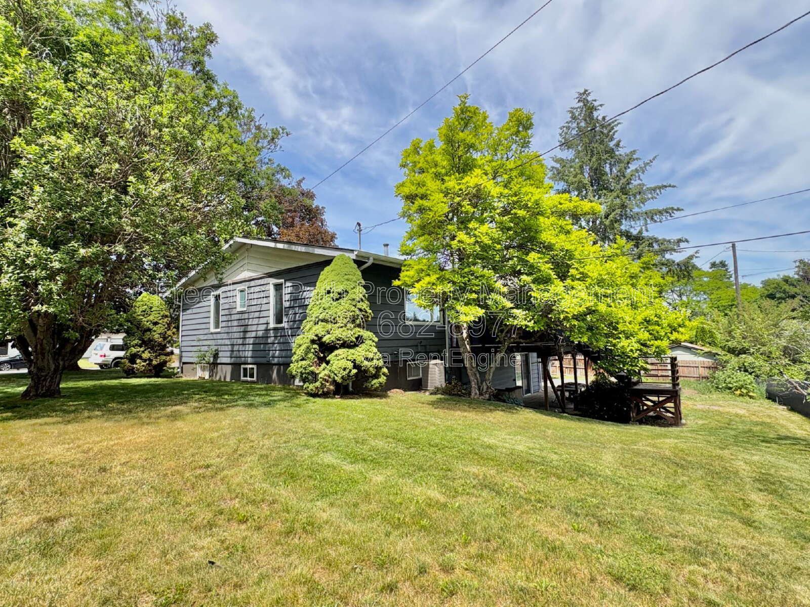 Spacious 4 Bed + Flex Space Coeur d'Alene Home | 2,640 Sq Ft, Beautifully Updated, Large Deck with Views, Carport & Great Location property image