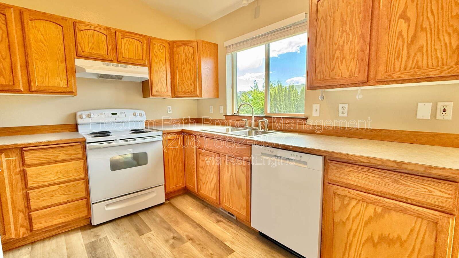 Spacious 5-Bedroom or 4 + Massive Bonus Room & Private Yard | 1930 W. Canfield Ave, Coeur d’Alene property image